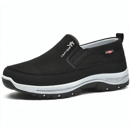Svart ortopedisk slip-on sko för herr med vit sula och ventilerande material
