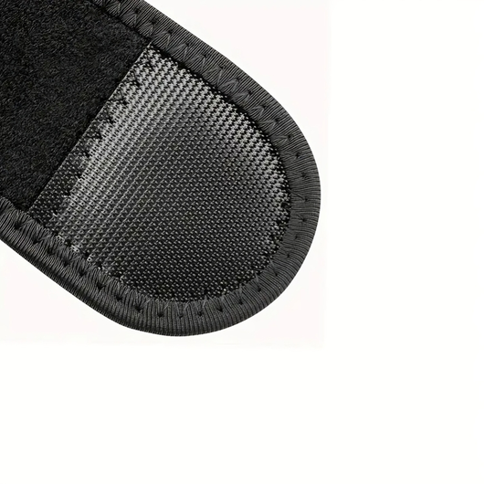 Närbild på axelstödets andningsbara mesh-material och neoprenyta med sömmad kant